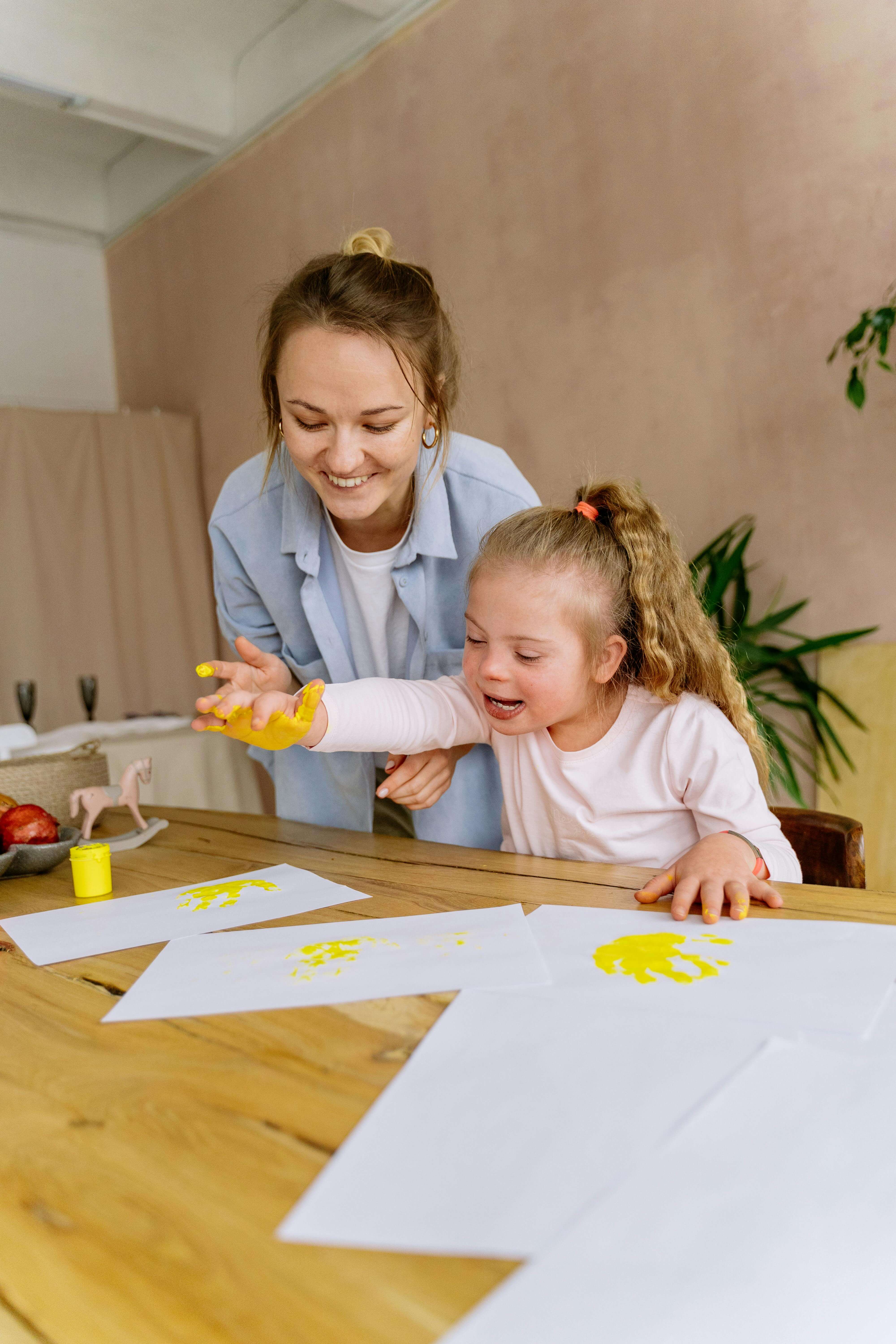 ABA therapist working with a child at home